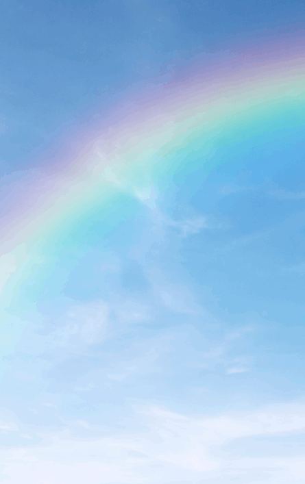 Rainbow across a blue sky